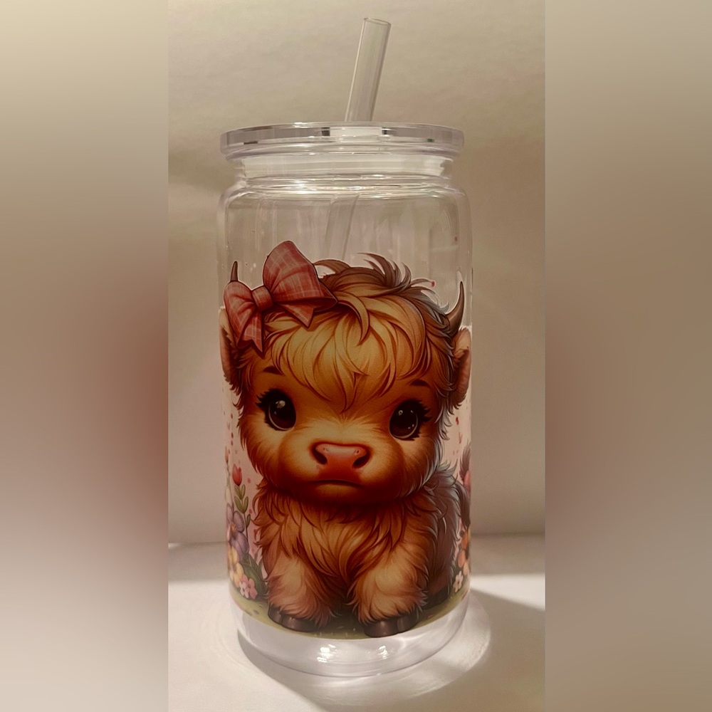 Adorable Highland Cow with pink bow tumbler.
